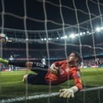 Facundo Cambeses ataja el penal ante Belgrano