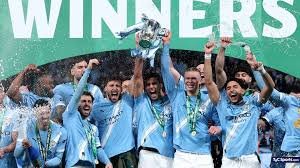 Jugadores de Manchester City celebran el título de la Carabao Cup
