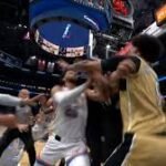 Jugadores de la NBA protagonizan una pelea cerca del público durante un partido